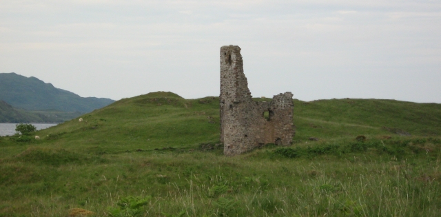 ardvrek castle ruins, just part of a tower and wall among grassy hills